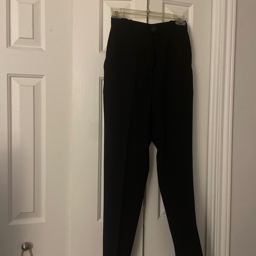 Chanel Women’s lined Black Pants. 2 side pockets and bottom cuffs. Italian 38